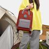 Farbblock-Rucksack mit Fronttasche und gepolsterten Schultergurten