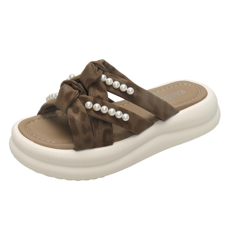 

Thick-bottomed pearl slippers women s summer wear 2025 new versatile fairy style with skirt lazy one pedal sandals 40