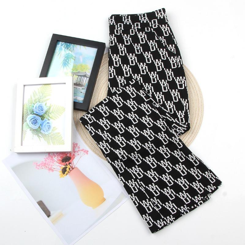 

Black micro-pull pants large size women s pants spring and autumn senior sense thin plaid pants flared pants women s high waist pull pants small 4XL (130-75 kg