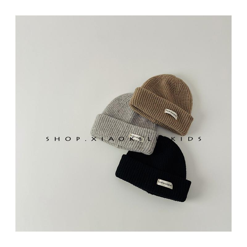Kinderwollmütze im koreanischen Stil Herbst- und Winterstil Vielseitige Baby-Strickmütze mit Ohrenschutz Jungen- und Mädchenwollmütze Kältemütze