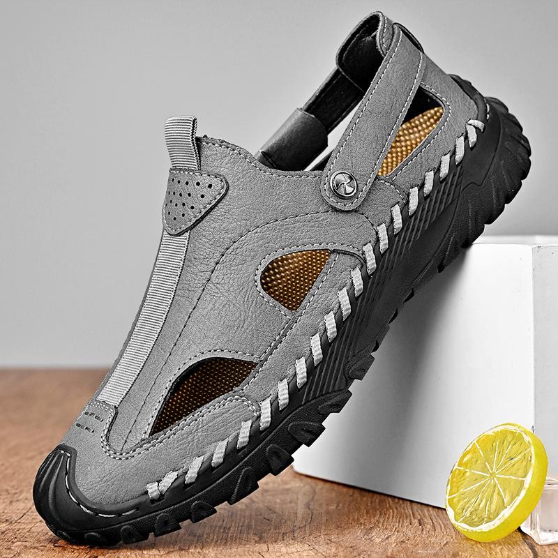 

Чоловічі літні дихаючі шкіряні сандалі на м якій підошві, що запобігають протіканню 46 сірий колір