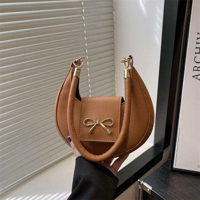 

Beautiful simple casual retro solid color summer new bow fashion design single shoulder armpit crescent bag коричневий