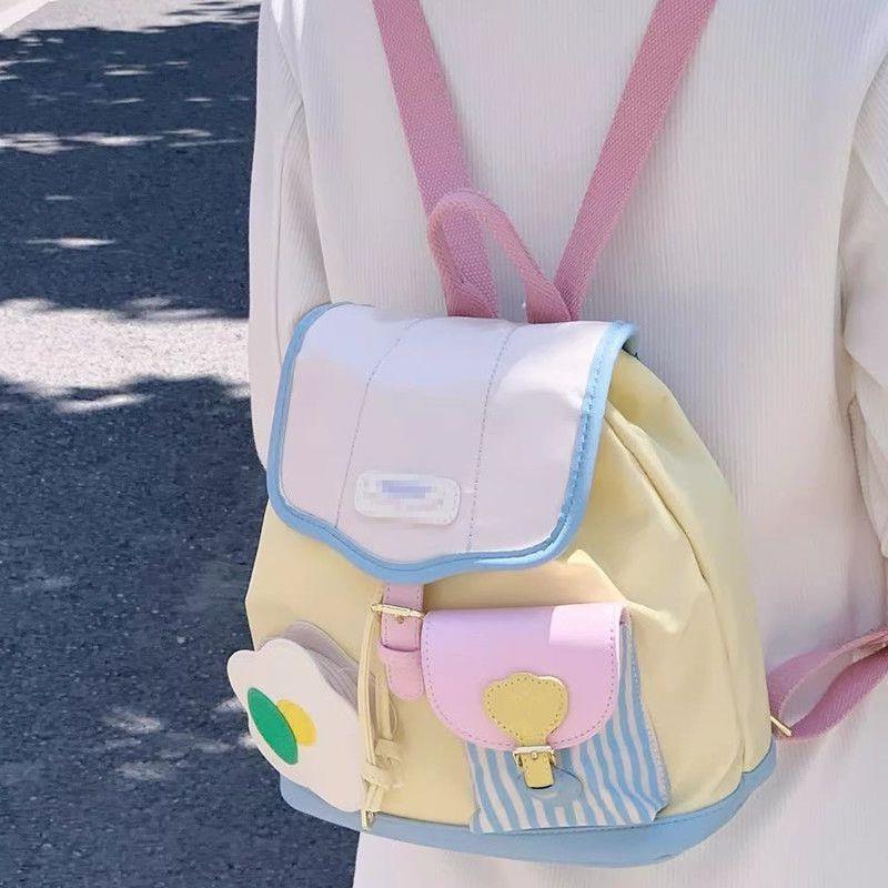 

Рюкзак сумка женская летняя 2024 года высококачественная текстура нишевый дизайн студенческий милый портативный рюкзак большой емкости жёлтый