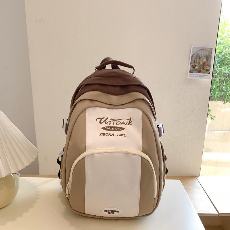 

Backpack New ins women s lightweight and versatile fashion backpack, high value, simple and large capacity student schoolbag Single pack темно-коричневого кольору