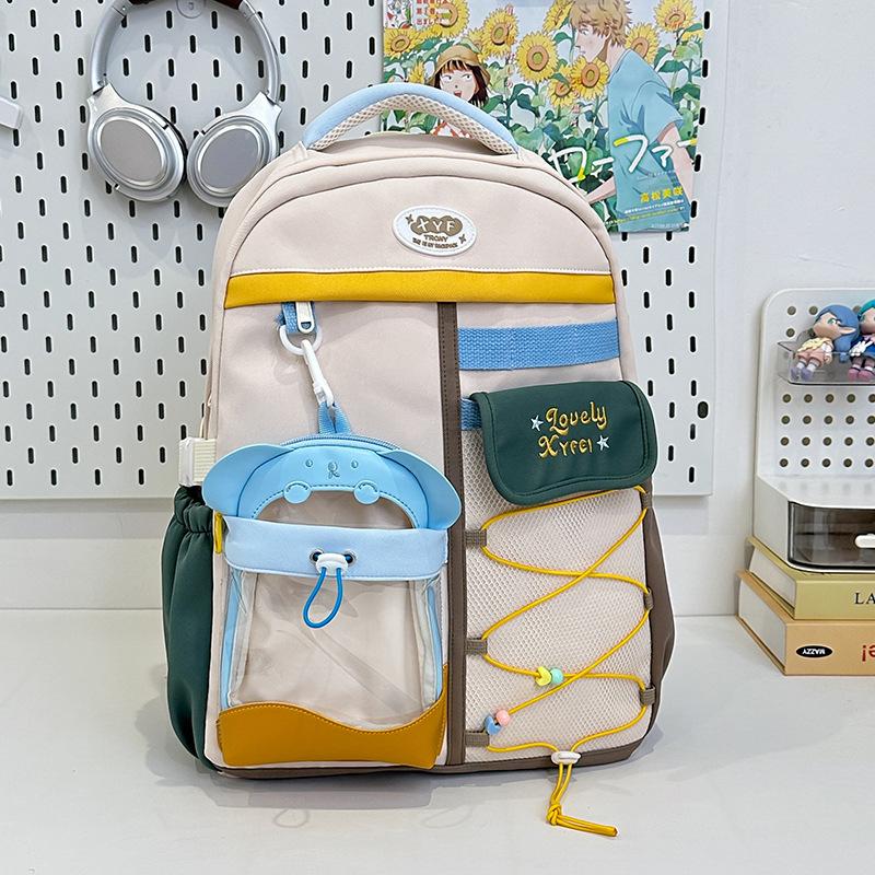 

New fresh and sweet contrasting color splicing bar early high school students lightweight large-capacity backpack