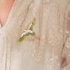 Chic Crane & Cloud Brooch: Elegant, Versatile Suit Accessory for Women.