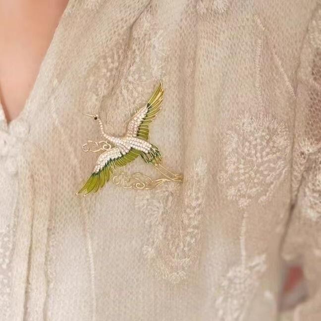 Chic Crane & Cloud Brooch: Elegant, Versatile Suit Accessory for Women.