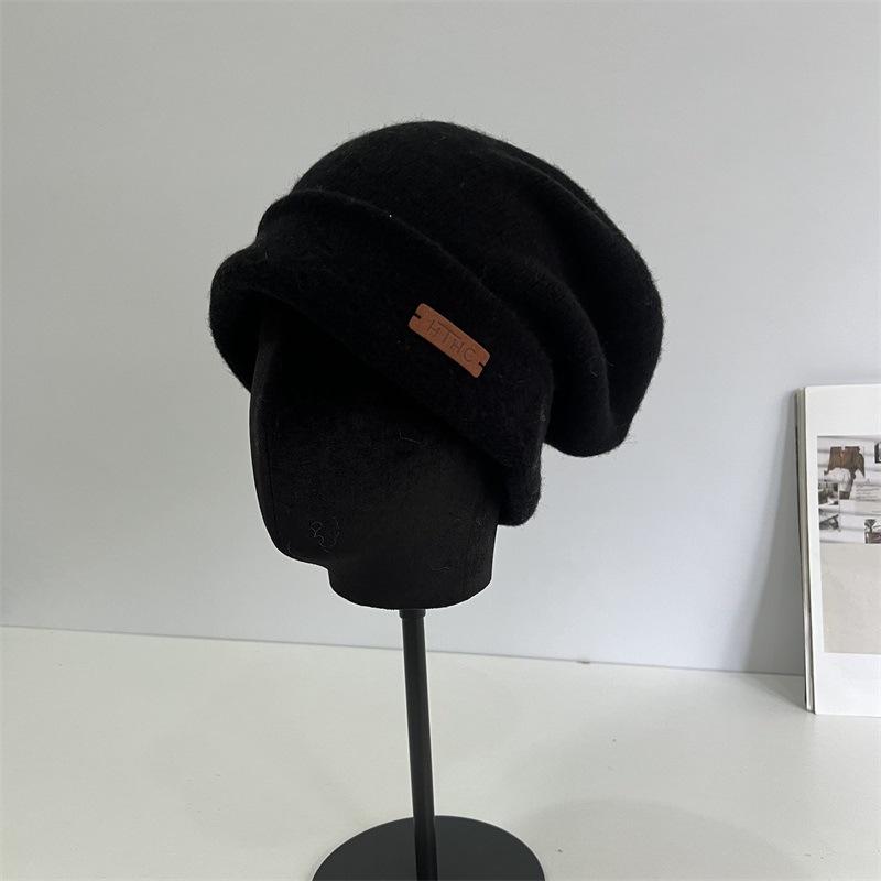 

Autumn and winter new all-wool knitted hat women s big head circumference shows the face small pile hat warm ear protection confinement hat tide M（56-58cm） чёрный
