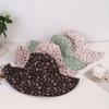 Artistic style full edition small floral large eaves windproof rope fisherman hat suitable for ladies outdoor photos