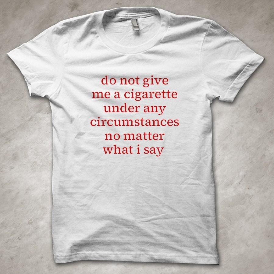 No me des un cigarrillo sin importar lo que diga - Camiseta divertida