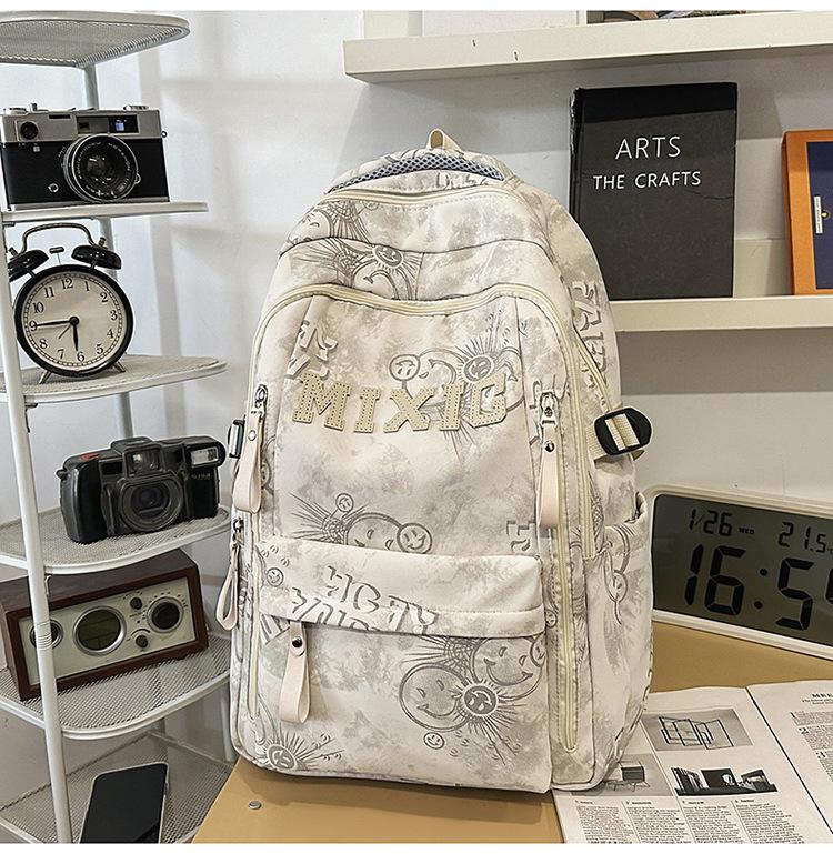 Schoolbag trendy school bag male high school student female graffiti junior high school student backpack college student large capacity lightweight