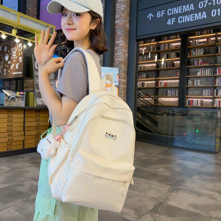 Schoolbag Korean version of high value large capacity casual solid color simple versatile junior high school student backpack