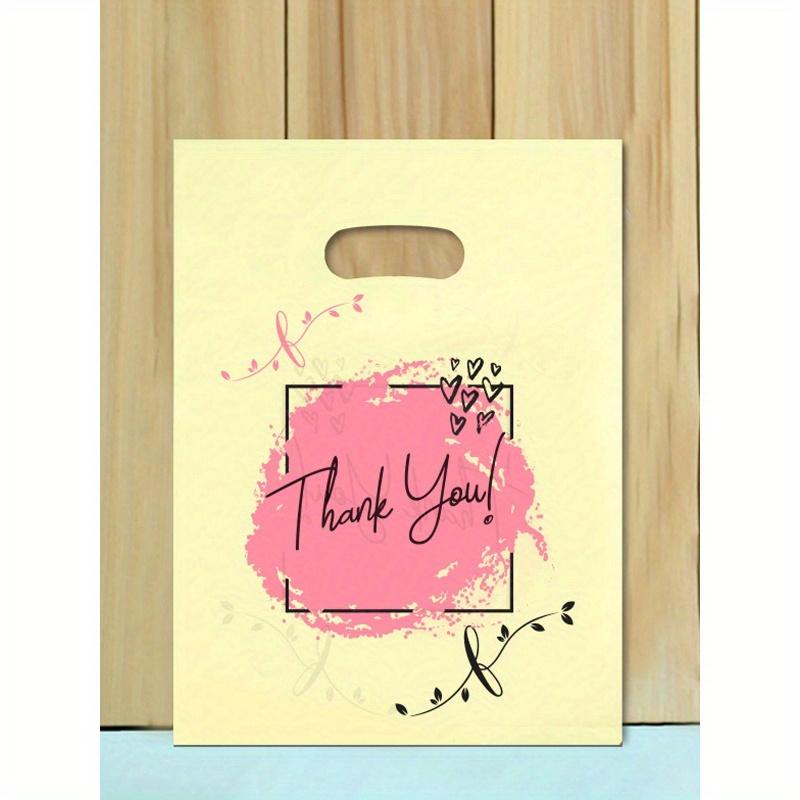 

Бежевые пластиковые подарочные пакеты с надписью «Спасибо», хозяйственные сумки, сумки-тоут для одежды, перфорированный дизайн, логотип «Спасибо» в форме сердца, подходят для Хэллоуина, Рождества 15cm*20cm