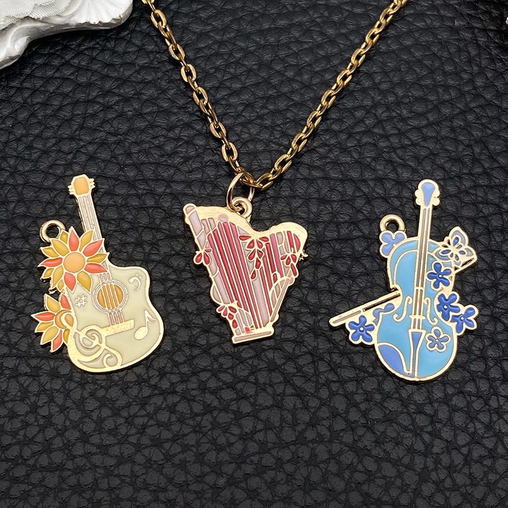 Colorful Alloy Musical Instrument Keychain Pendant: Harp, Guitar, Cello Charm