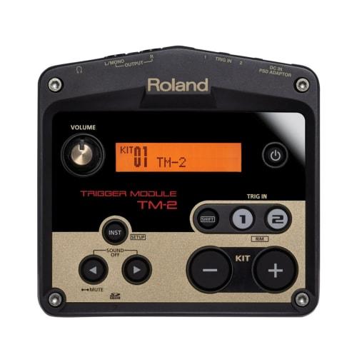 Roland TM-2 Trigger Module, a hybrid drum sound module ideal for live performance and practice. Supports SD card and battery operation, with two trigg