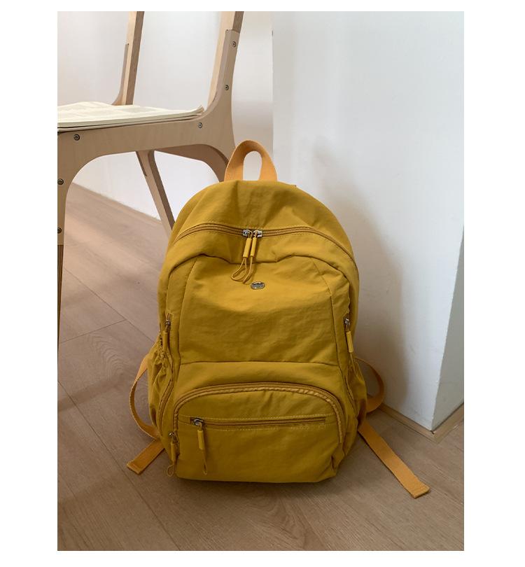 Ultra-light schoolbag waterproof and lightweight nylon cloth large-capacity backpack new student leisure travel bag women