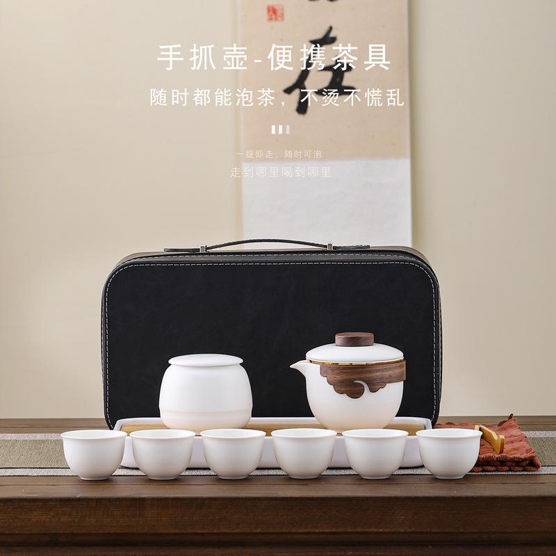 Ceramic creative hand-held pot portable outdoor camping travel tea set business gift set can be done