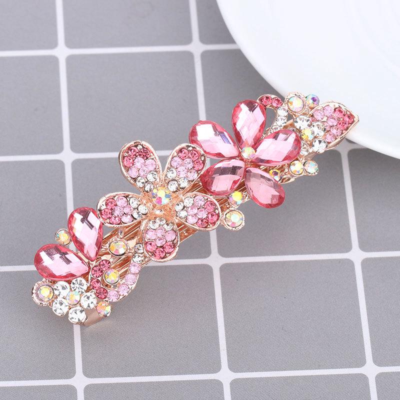 Mengpei Large Crystal Flower Hair Clip: Elegant Rhinestone Ponytail Accessory for Women.