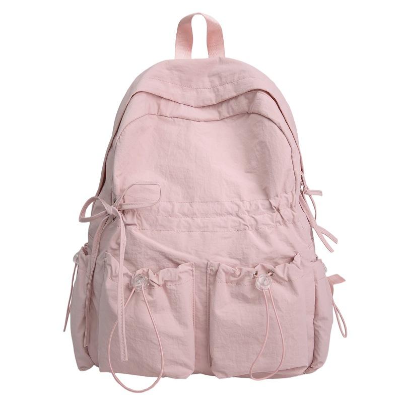 Large capacity schoolbag female junior high school student cute bow high school large backpack female student high value college backpack