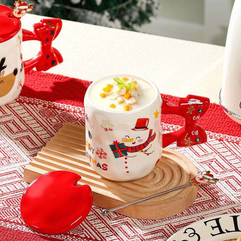 Hochwertig aussehende Weihnachtspaar Keramiktasse Weihnachts-Wasserbecher Souvenir-Geschenk Schleife Cartoon-Tasse