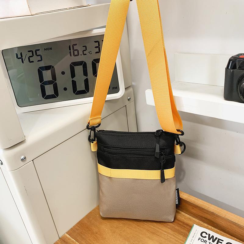 Japan and South Korea fashion new simple literary and artistic fan shoulder messenger bag 2025 commuter sports niche leisure small square bag