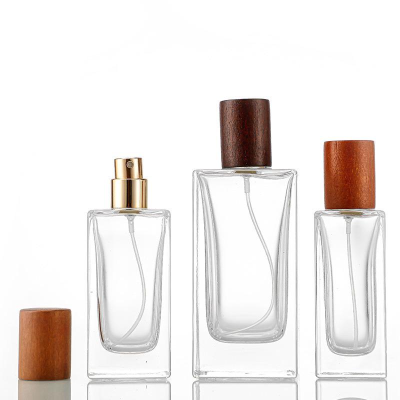 High-Grade Transparent Glass Perfume Bottle with Wooden Lid, 50ml/100ml, Fine Mist for Skincare Decanting