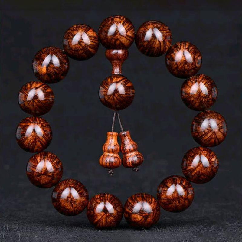 Authentic Hainan Huanghuali Beads with Ghost Eyes Design 13 pieces - 18mm
