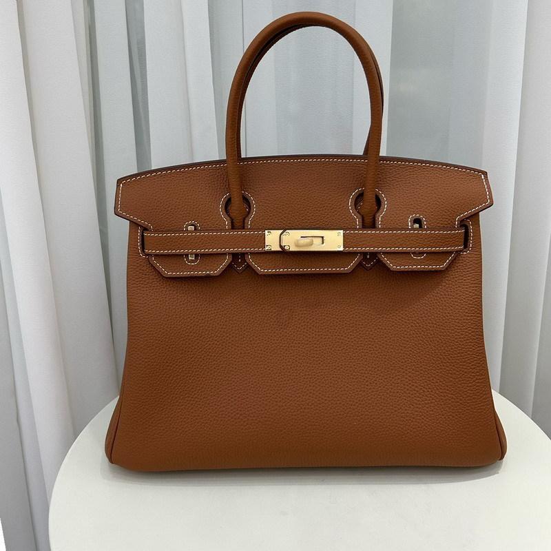 Nowy wzór Togo, skóra bydlęca pierwszej warstwy, wysokiej jakości przenośna torba listonoszka damska, duża pojemność