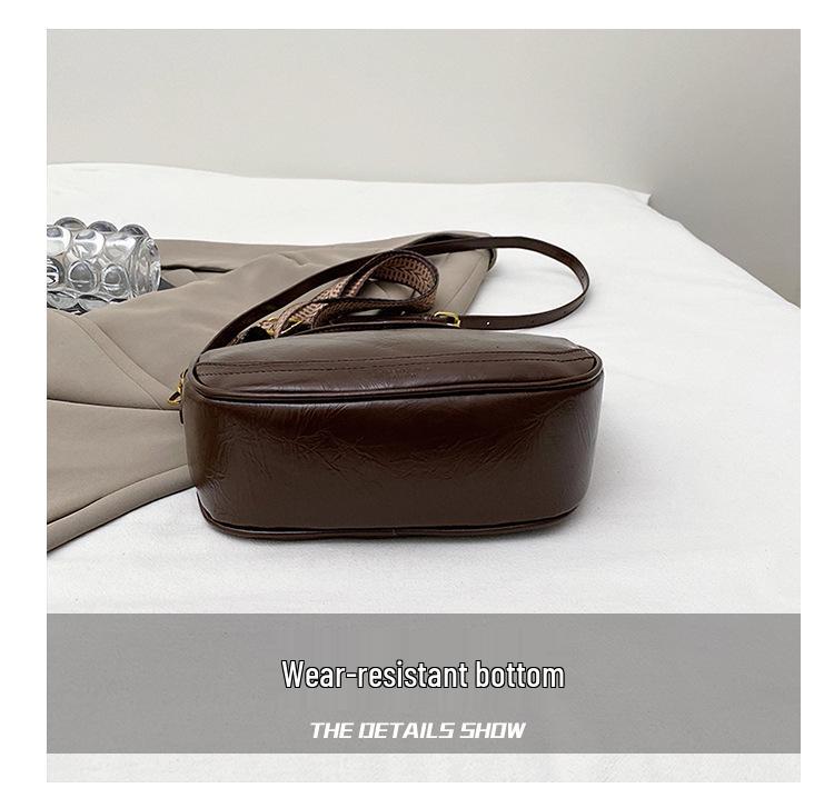 Niche Women's Retro Crossbody Dumpling Bag - 2025 Autumn/Winter Collection, Versatile High-End Shoulder Bag.