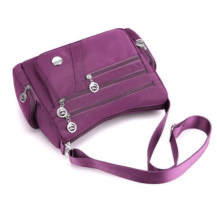 Damska wodoodporna nylonowa torba crossbody Duża pojemność Wielokieszeniowa torba na ramię Lekka podróżna torba-listonoszka Codzienna portmonetka