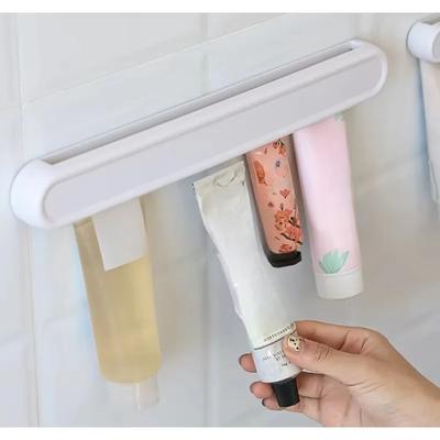 Wandmontierter Zahnpastahalter Badezimmer Bohrfrei Gesichtsreiniger Zahnpasta Aufbewahrungsregal