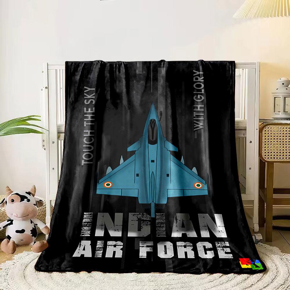 

A sleek blue fighter jet centered on a black background with vertical lines. for all seasons blanket lunch break throw gift 80cm x 120cm