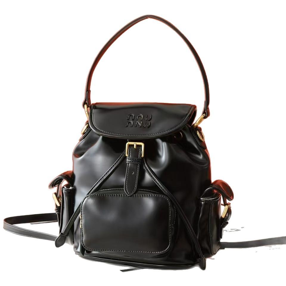 Nový Miao miu 2025 plátěný batoh velkokapacitní prémiový pocit všestranný přenosný ramenní cestovní dojížděcí batoh