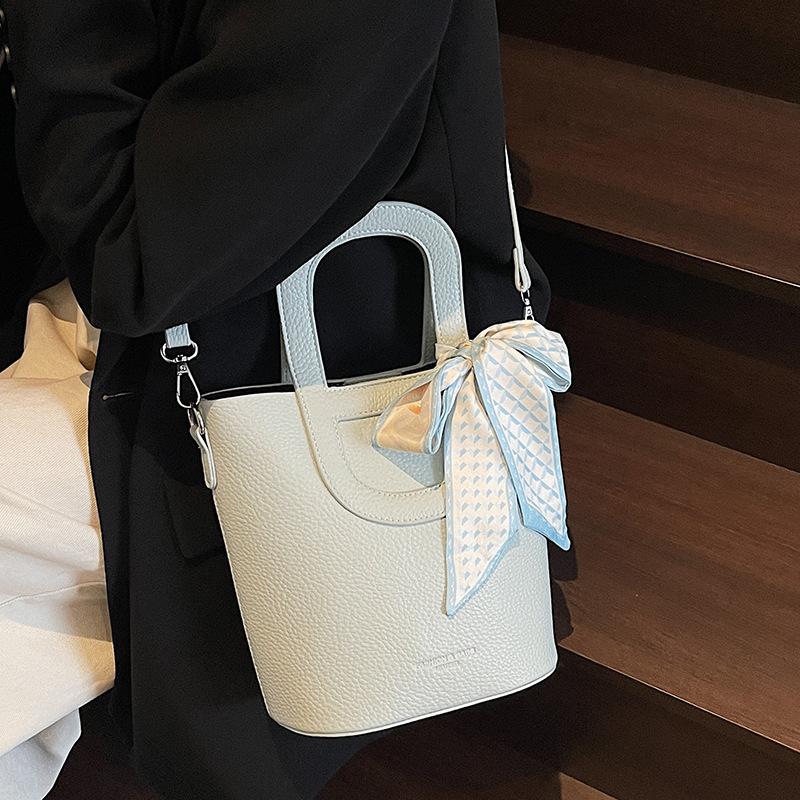 Casual bucket bag women's bag 2025 summer new Korean version of the vegetable basket bag hand-to-shoulder crossbody commuter bag