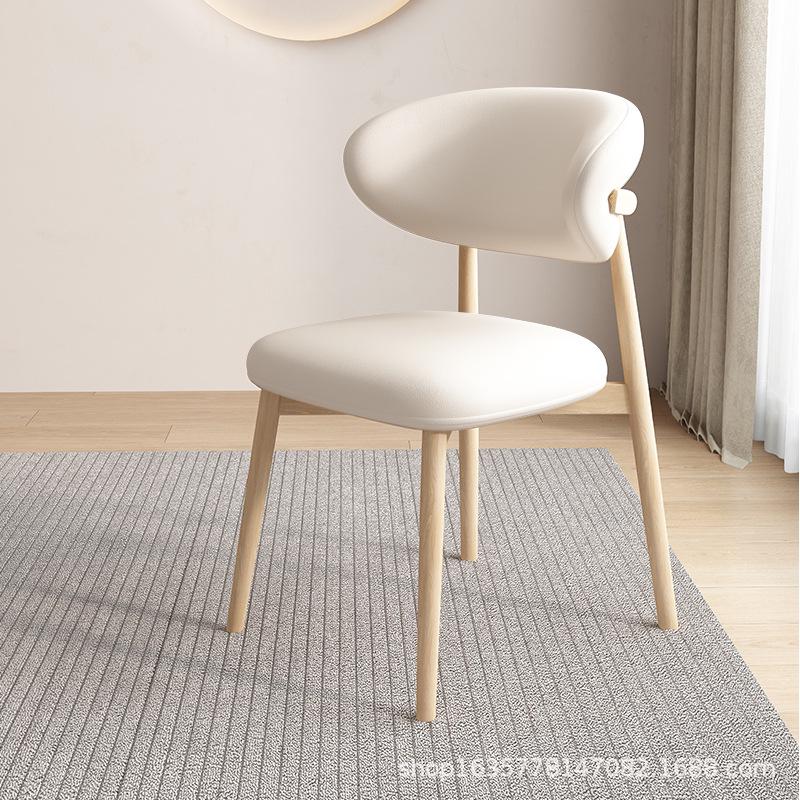 Nordic Modern Minimalist Solid Wood Dining Chair with Soft Pack Backrest - Comfortable Light Luxury Ram's Horn Design for Home, Restaurant, and Hotel.