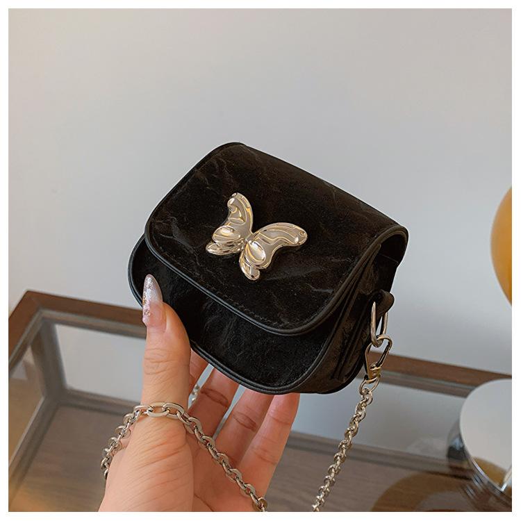 

Premium small bag women s summer new mini lipstick oblique span bag this year popular butterfly chain shoulder bag чорний