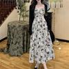 French gentle wind sleeveless dress women's summer design sense temperament waist printing A word suspender medium and long skirt