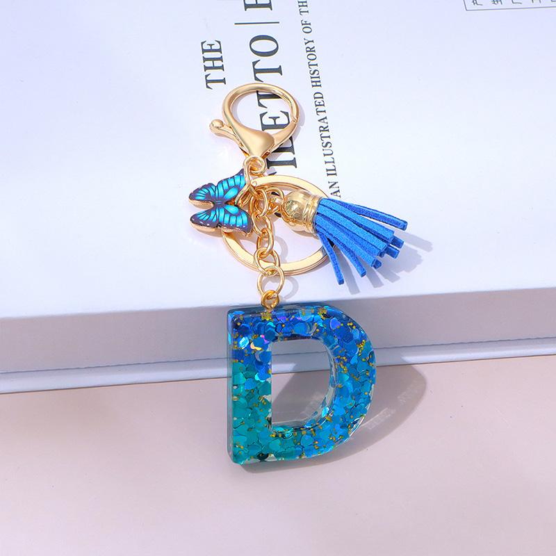 1 Stück Schriftzug Schlüsselanhänger für Rucksackanhänger Schlüsselanhänger Schlüsselring mit Quaste Schmetterling Niedlich Farbverlauf Harz Blau Pailletten