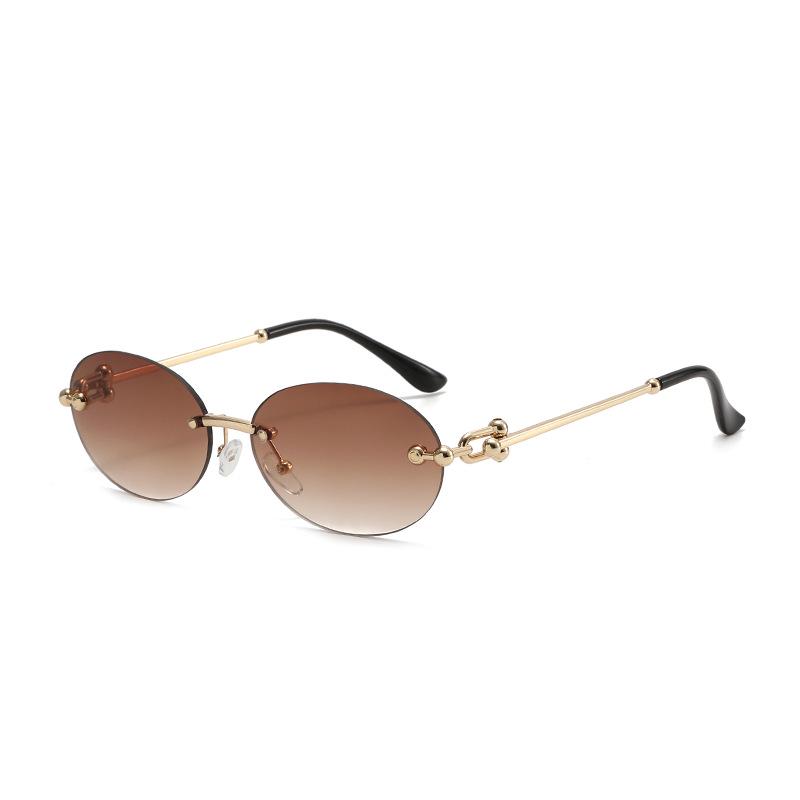 2025 Trendy Retro Rimless Metal Sunglasses: European & American Style UV Protection for Women