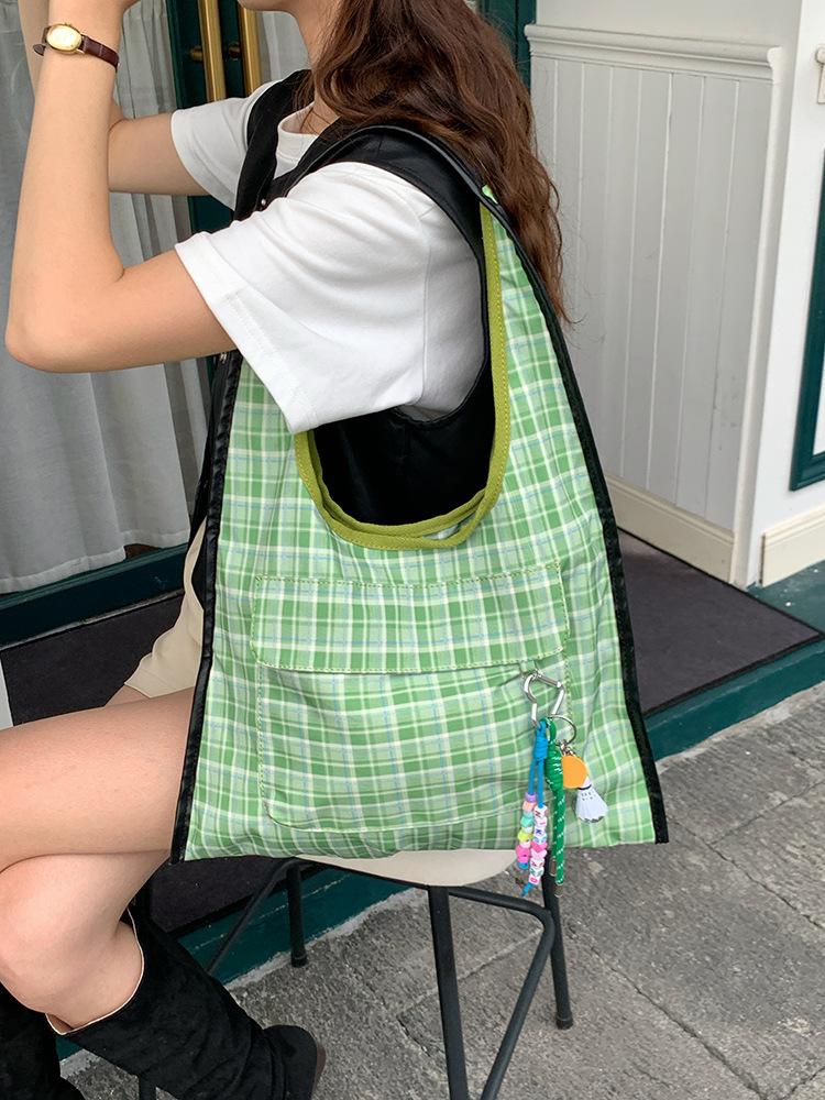 

New design sense niche large capacity casual simple leopard print shoulder bag commuter underarm premium portable canvas bag