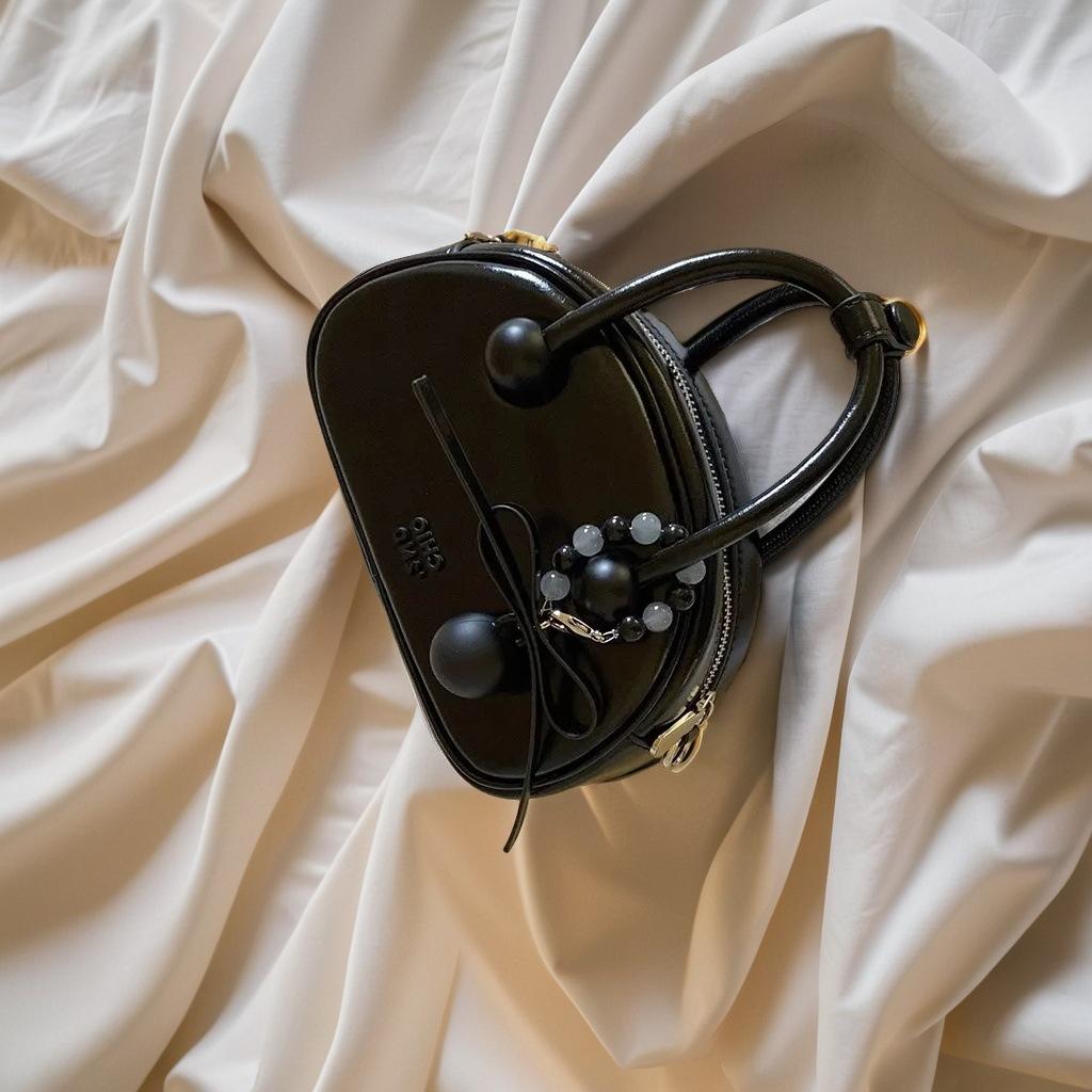 

Nanfeng Chio2n simple fashion sweet dating exquisite small bag female wedding portable shoulder messenger bag чорний