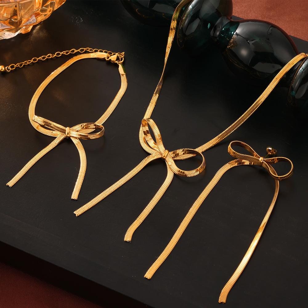 Trendy Bow Earrings & Jewelry Set: Niche Metal Design