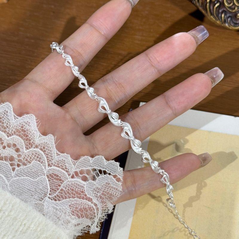 Художественный браслет-бант для женщин: Высококлассный, универсальный, нишевый дизайн с трехмерным бантом