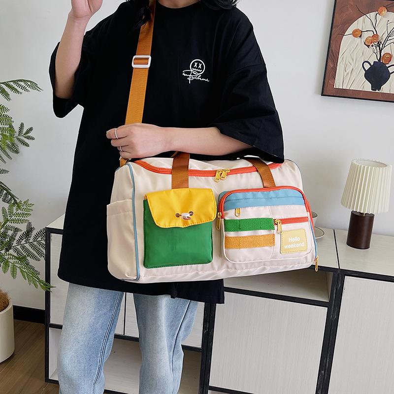 Contrasting color leisure sports fitness bag women's large-capacity portable messenger luggage bag light and short-distance business travel bag men