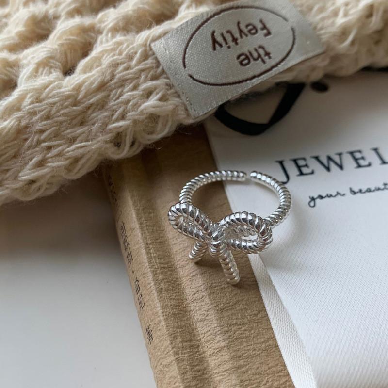 

Solid Korean Trendy Twisted Bow Knot Finger Ring For Women Fashionable Design J5495