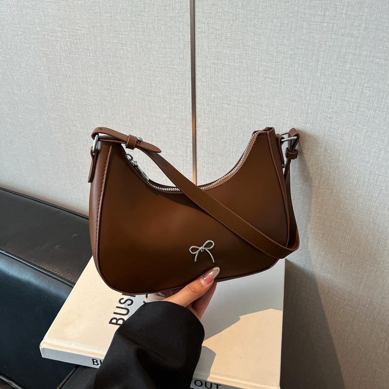 Neue modische einfarbige Tasche Textur lässige Schleife Knödeltasche Einzelne Schulter Achseltasche Mondzahn-Tasche schwarz