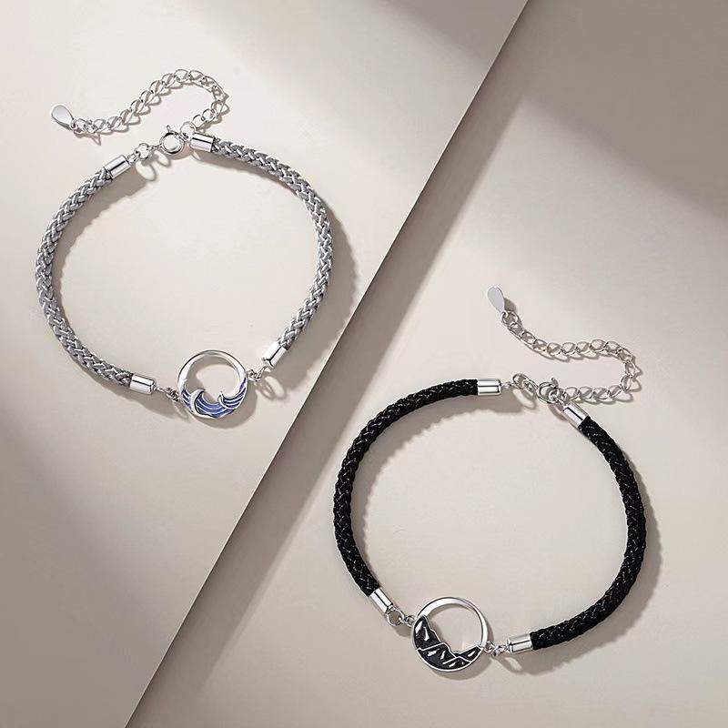 A stylish woven moon pendant bracelet, a couple's jewelry piece suitable for everyday wear by couples.
