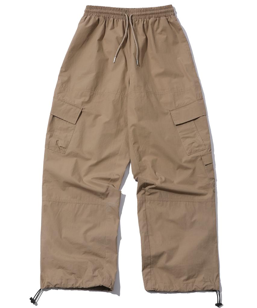 CPGN STUDIO Weite Cargohosen Beige