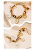 European Retro Tortoiseshell Chain Bracelet with Gold Flower and Pearl Pendant, Versatile Stainless Steel Jewelry.