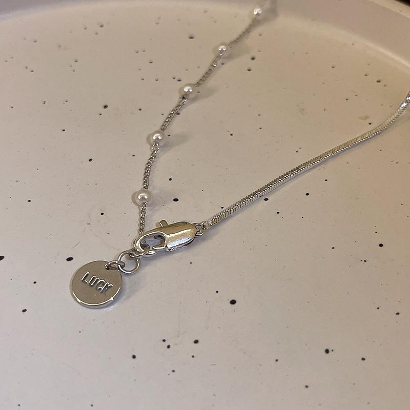 

Элегантное ожерелье с жемчужной подвеской 2023 года: Цепочка для свитера Niche Design для женщин